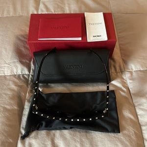 Original new Valentino Sunglasses(model 2043) with stones.